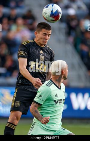 Los Angeles, California, USA. 8th Apr, 2023. Los Angeles FC defender Jesus David Murillo (3) heads the ball agaisnt Austin FC midfielder Diego FagÃºndez (14) during an MLS soccer match at BMO Stadium Saturday, April 8, 2023, in Los Angeles. (Credit Image: © Ringo Chiu/ZUMA Press Wire) EDITORIAL USAGE ONLY! Not for Commercial USAGE! Stock Photo