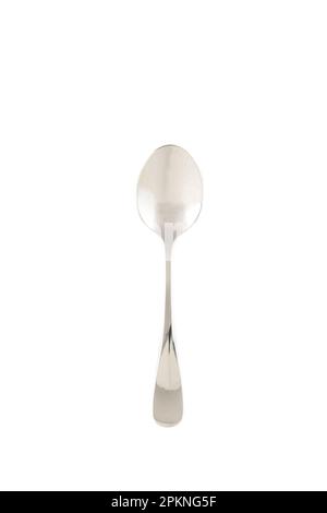 Little silver spoon isolated on white background. Top view Stock Photo