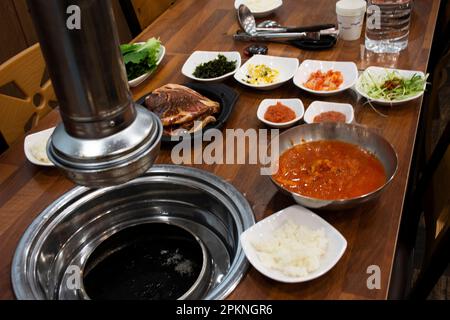 Local traditional korean gourmet food black pig of Jeju Island for grilled roasted barbecue pork and seasoning side dish for korean people taste eat d Stock Photo