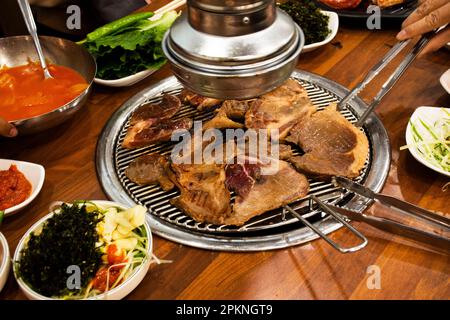 Local traditional korean gourmet food black pig of Jeju Island for grilled roasted barbecue pork and seasoning side dish for korean people taste eat d Stock Photo