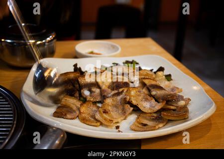 Local traditional korean gourmet food black pig of Jeju Island for grilled roasted barbecue pork and seasoning side dish for korean people taste eat d Stock Photo