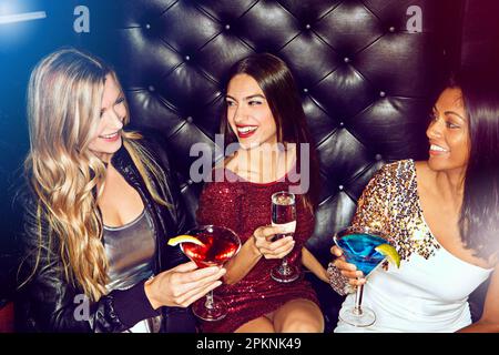 Its the perfect night for ladies night. a group of young women enjoying a night out at the club. Stock Photo