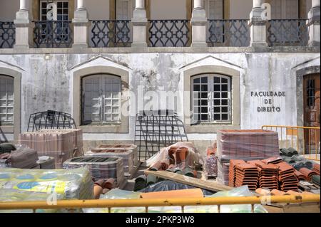 Coimbra, Portugal - August 15, 2022: Construction materials stored outside Faculdade de Direito University of Comibra Stock Photo