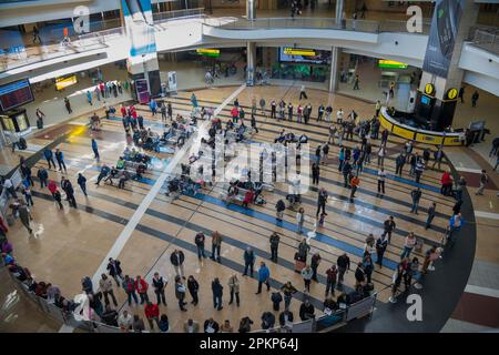 O. R. Tambo International Airport hall with waiting greeters, Johannesburg, South Africa, Africa Stock Photo