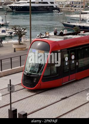 NICE, FRANCE- CIRCA MARCH, 2023: Red tram in Port Lympia station on a 2 line, travel content Stock Photo