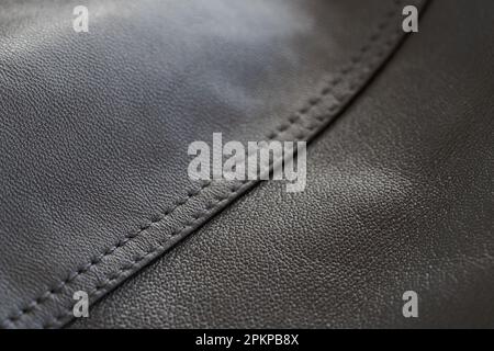 Detail shot of supple leather jacket with stitching, shallow focus Stock Photo