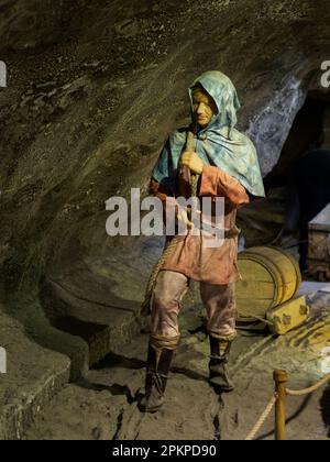 Wieliczka, Poland - June 2022: Interior of a salt mine. Characters showing various situations in the life of a salt mine. Europe Stock Photo