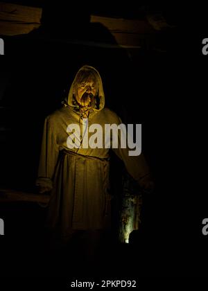 Wieliczka, Poland - June 2022: Interior of a salt mine. Characters showing various situations in the life of a salt mine. Europe Stock Photo