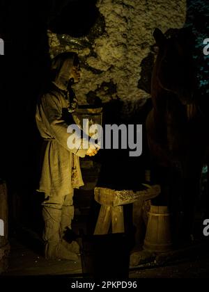 Wieliczka, Poland - June 2022: Interior of a salt mine. Characters showing various situations in the life of a salt mine. Europe Stock Photo