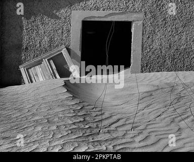 Kolmanskop (Afrikaans for Coleman's hill, German: Kolmannskuppe) is a ghost town in the Namib desert in southern Namibia, a few kilometres inland from Stock Photo