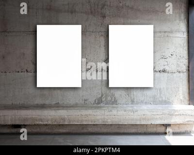 Two white blank rectangle picture frames, vertical style. Couple empty square artist canvas space hanging on concrete wall background over empty cemen Stock Photo