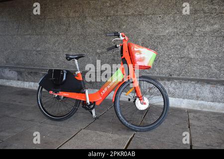 Lime bike in an underpass in Central Milton Keynes. Stock Photo