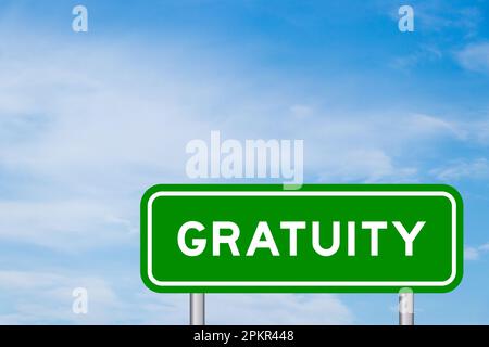 Green color transportation sign with word gratuity on blue sky with white cloud background Stock Photo