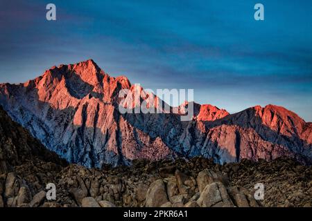 Lone Pine Peak rises to the east of Lone Pine near Mt. Whitney in the Sierra Nevada mountains in California. Stock Photo