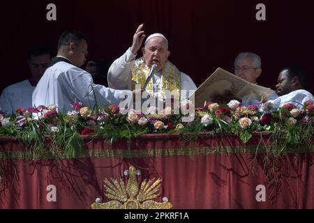 Vatican. 9th Apr, 2023. Pope Francis delivers the 'Urbi et Orbi' blessing to the city and to the world from the balcony of St Peter's basilica after the Easter Sunday Mass on April 9, 2023 in Vatican. Credit: dpa/Alamy Live News Stock Photo