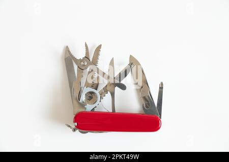 Multifunctional knife on a white background Stock Photo