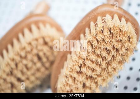 kitchen brushes hang in supermarket Stock Photo