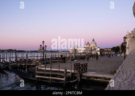 View of the Riva degli Schiavoni, a monumental waterfront in Venice. It is located in the sestiere of Castello and extends along the San Marco basin Stock Photo