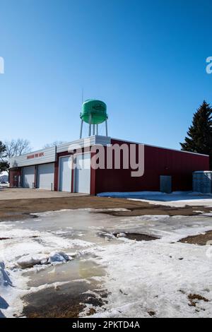 Green water tower and fire hall in Moosomin, Saskatchewan, Canada Stock Photo