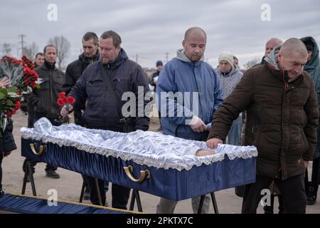 Family And Relatives Bid Farewell At A Funeral Of A Soldier Who Died In ...