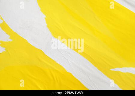 Color creased torn paper poster as background Stock Photo