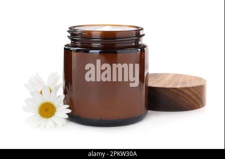 Jar of hand cream and chamomiles on white background Stock Photo