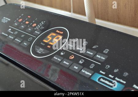 Close up view of washing machine digital control panel. Stock Photo