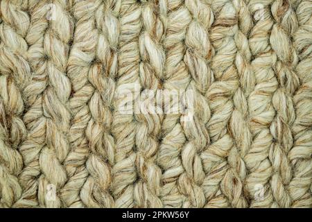 Close up of hand-woven wool living room rug background Stock Photo