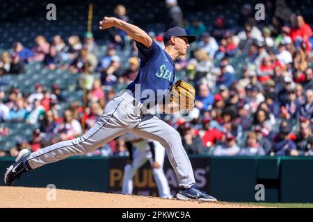 CLEVELAND, OH - APRIL 09: Seattle Mariners shortstop J.P. Crawford (3)  throws to first base for an out during the tenth inning of the Major League  Baseball game between the Seattle Mariners