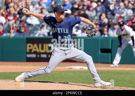 CLEVELAND, OH - APRIL 09: Seattle Mariners shortstop J.P. Crawford (3)  throws to first base for an out during the tenth inning of the Major League  Baseball game between the Seattle Mariners