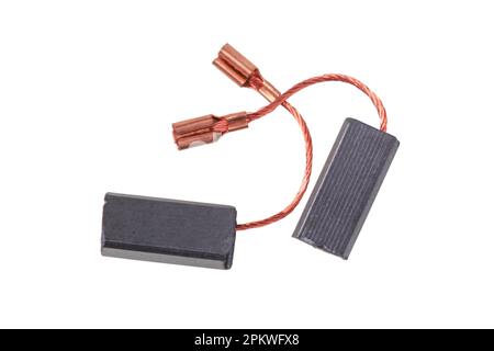 Carbon brushes from a repair kit for an electric motor isolated on a white background Stock Photo