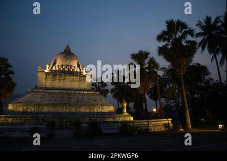 Scene of twilight at the Lotus Stupa also known as 'That Pathum' is one of the unique features of Wat Wisounrat is the Watermelon Stupa, Stock Photo