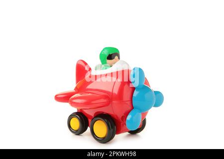 Plastic toy plane isolated on white background. Top view Stock Photo