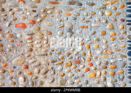 Plaster with pebble at wall . Stones texture background Stock Photo