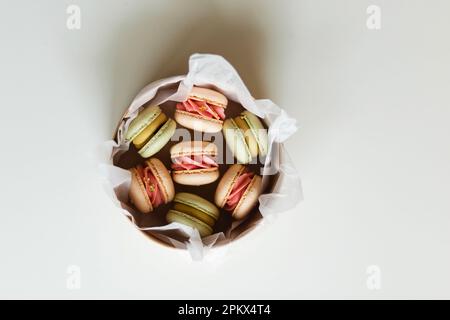 box of freshly made macaroons in the kitchen Stock Photo
