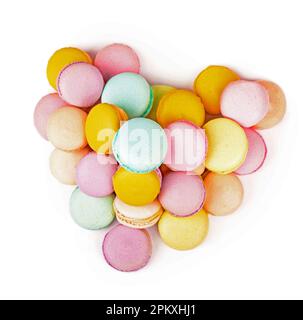 Delicious three multicolored macaroon on a white Stock Photo