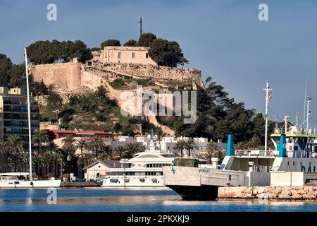 Picturesque castle by the sea, built in the 11th century, with exhibitions of historical objects. Archaeological Museum of Denia, Alicante, Spain. Stock Photo