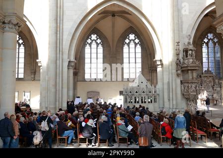 Magdeburg, Germany. 10th Apr, 2023. Guests watch the festive service in the cathedral for the inauguration of five newly cast bells for the cathedral bell ringing. Credit: Peter Gercke/dpa-Zentralbild/dpa/Alamy Live News Stock Photo