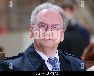 Magdeburg, Germany. 10th Apr, 2023. Reiner Haseloff (CDU), Minister President of Saxony-Anhalt, sits in the cathedral during a festive service to inaugurate five newly cast bells for Magdeburg Cathedral's ringing. Credit: Peter Gercke/dpa-Zentralbild/dpa/Alamy Live News Stock Photo