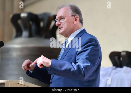 Magdeburg, Germany. 10th Apr, 2023. Reiner Haseloff (CDU), Minister President of Saxony-Anhalt, gives a speech in the cathedral during a festive service to inaugurate five newly cast bells for the cathedral bell ringing. Credit: Peter Gercke/dpa-Zentralbild/dpa/Alamy Live News Stock Photo