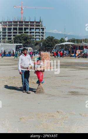 Kathmandu,Nepal - Jan 14,2023 : Pani Puri Seller waiting for Customer in Tudikhel. Life of Nepali Street Seller, Street Market Nepal. Stock Photo