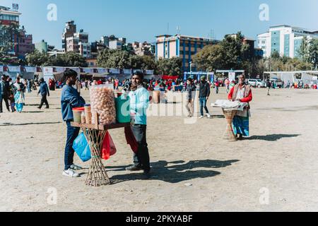 Kathmandu,Nepal - Jan 14,2023 : Pani Puri Seller waiting for Customer in Tudikhel. Life of Nepali Street Seller, Street Market Nepal. Stock Photo