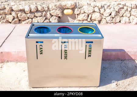 Recycle trash bins with garbage icons in Egypt hotel. Stock Photo