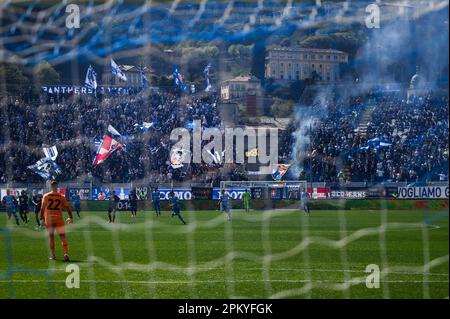 Supporters of Como 1907 during the Serie B match between Benevento Calcio  and Como 1907 at Stadio Vigorito, Benevento, Italy on March 11, 2023. Photo  by Nicola Ianuale Stock Photo - Alamy