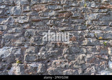Old british stone wall texture. Stock Photo