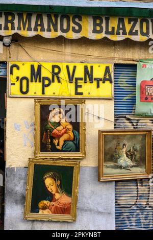 Pictures on sale in the Rastro flea market around the Calle de Lopez Silva between La Latina and Embajadores,  Madrid, Spain. Stock Photo