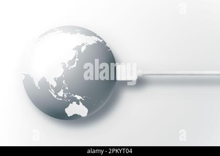 Round shaped globe world map connected by digital USB cable and placed against white background Stock Photo