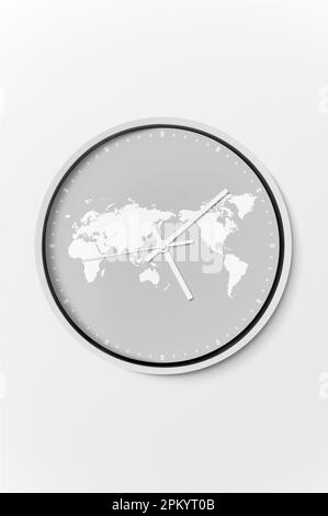 Creative design of round shaped clock with world map and arrows placed inside against white background Stock Photo