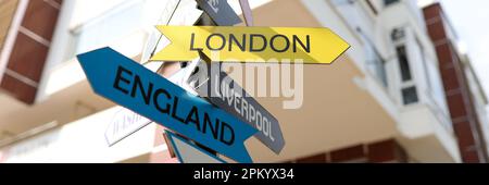 Tourist signs of cities and countries with directions Stock Photo