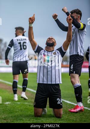 John Bostock #24 of Notts County praises god and celebrates his sensational strike during Vanarama National League match Wrexham vs Notts County at The Racecourse Ground, Wrexham, United Kingdom, 10th April 2023  (Photo by Ritchie Sumpter/News Images) Stock Photo